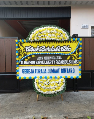 Papan Bunga Duka di Tayando Yamtel
