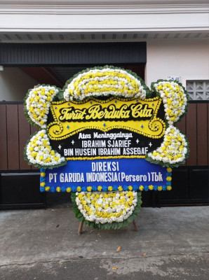 Papan Bunga Duka di Tayando Yamtel